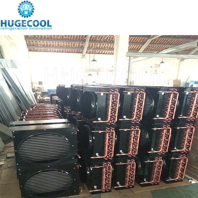 Horizontal tube and shell water cooled condenser